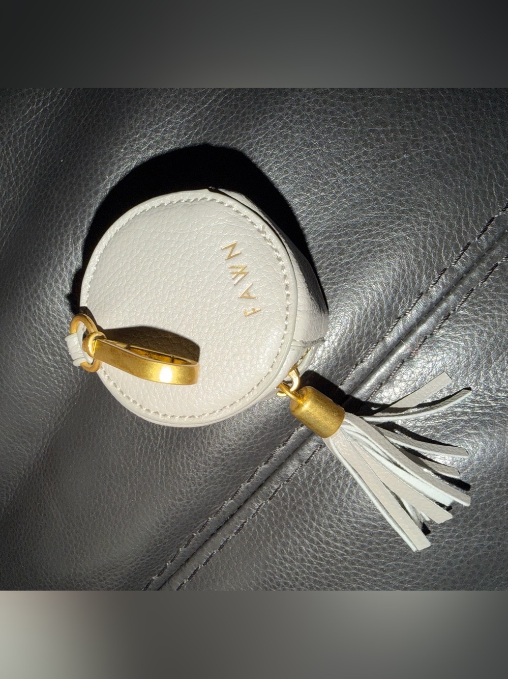Fawn faux leather pacifier holder nwot taupe tassel diaper bag key chain $40